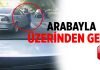 Önündeki adamın üzerinden arabasıyla geçti