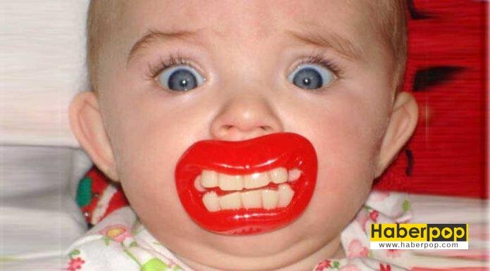 Komik emzikler ile fotoğraflanan sevimli bebekler