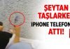 Şeytan taşlama sırasında şeytana iPhone atan adam